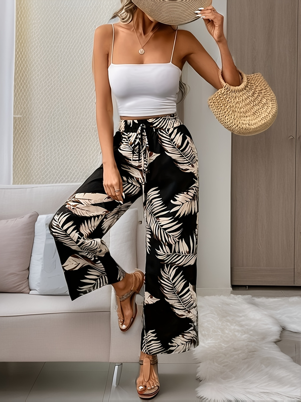 Pantaloni a gamba larga con vita alta e motivo floreale